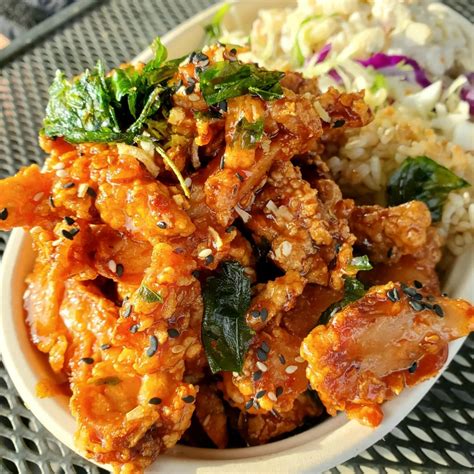 Buddha bruddah - A big combo of our Char Grilled Huli Huli Chicken and Hawaiian Grilled Beef, Served with two scoops Jasmine Rice, Mac Salad and Asian Slaw 